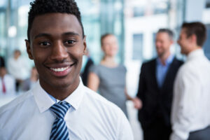Portrait of smiling businessman in office
